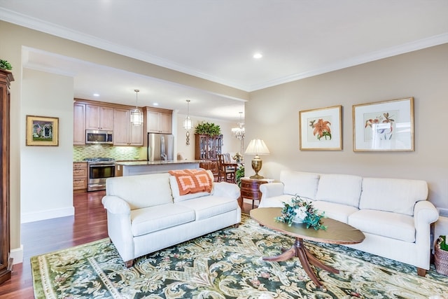 living room with dark hardwood / wood-style floors and ornamental molding