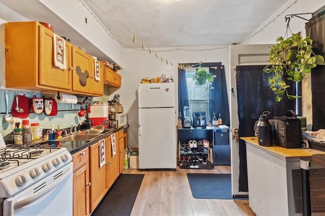 222-R Kimball St, Fitchburg, MA 01420 - kitchen featuring white appliances and light wood finished floors