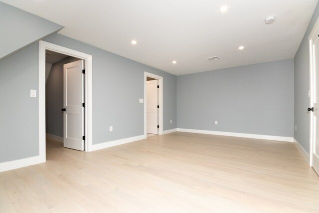 unfurnished room featuring light wood-type flooring