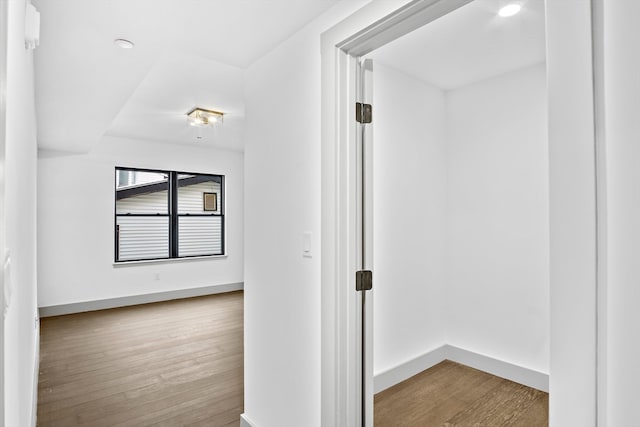 hall with light hardwood / wood-style floors