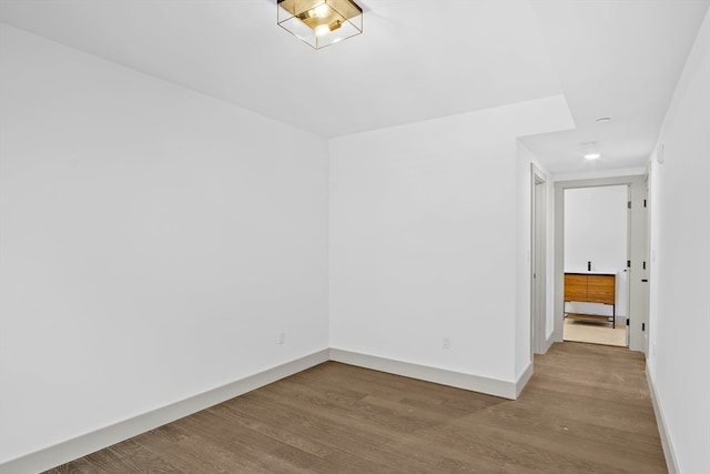 spare room with light hardwood / wood-style flooring