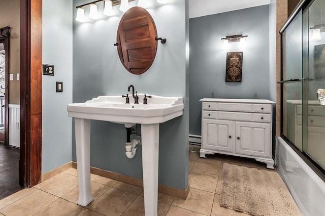 full bath with a baseboard radiator, enclosed tub / shower combo, baseboards, and tile patterned floors