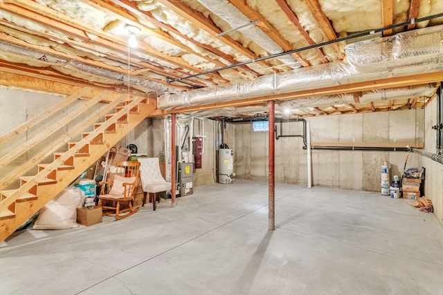 basement with gas water heater and heating unit