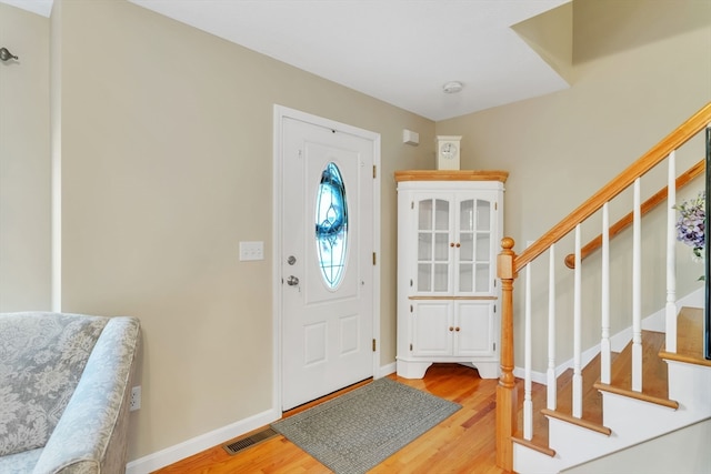 foyer with light hardwood / wood-style flooring