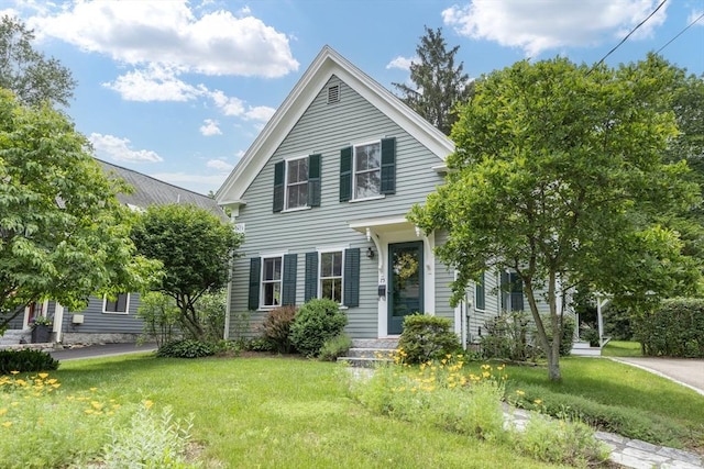 75 Union St, Holliston, MA 01746 - neoclassical / greek revival house featuring a front yard