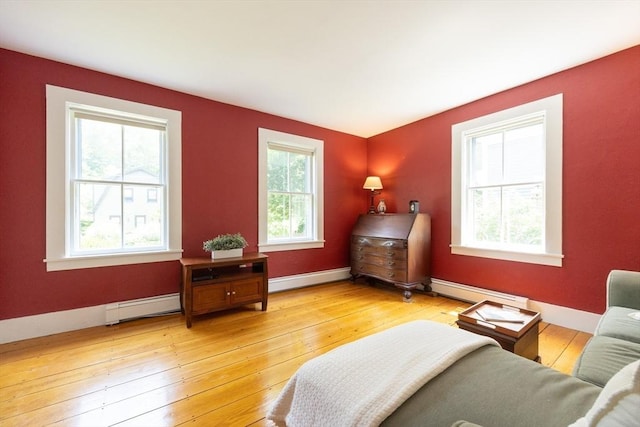 75 Union St, Holliston, MA 01746 - sitting room featuring baseboard heating and light wood-style flooring