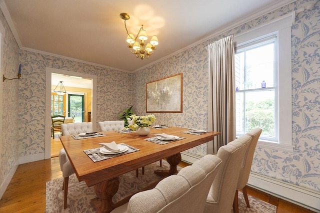 75 Union St, Holliston, MA 01746 - dining area featuring hardwood / wood-style floors, a chandelier, ornamental molding, and wallpapered walls