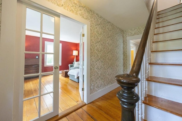 75 Union St, Holliston, MA 01746 - stairway featuring wood-type flooring and wallpapered walls