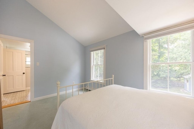 75 Union St, Holliston, MA 01746 - carpeted bedroom with lofted ceiling and baseboards