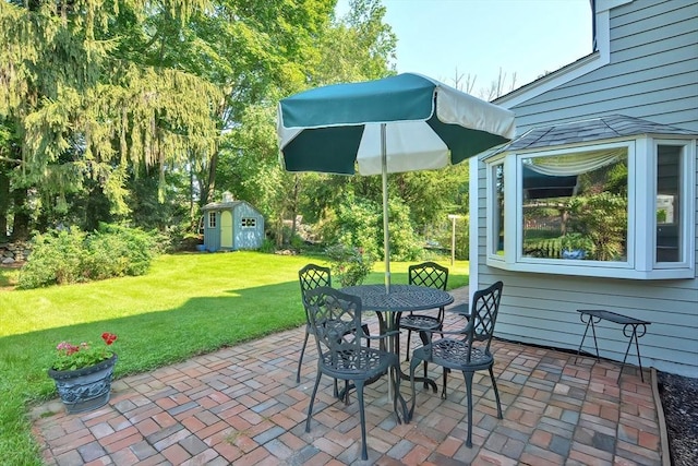 75 Union St, Holliston, MA 01746 - view of patio featuring outdoor dining space and a shed