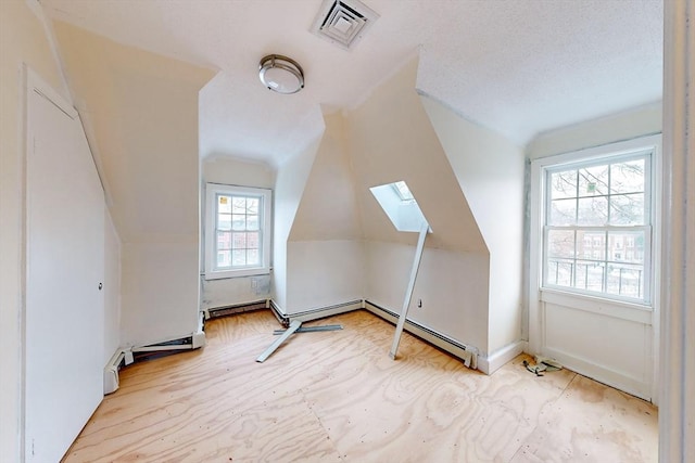 2 Waumbeck St, Boston, MA 02121 - bonus room featuring lofted ceiling with skylight