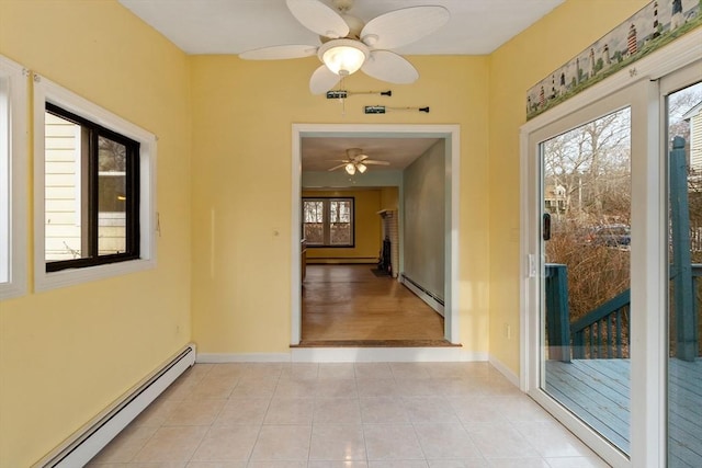 hallway featuring light tile patterned floors, baseboards, and baseboard heating