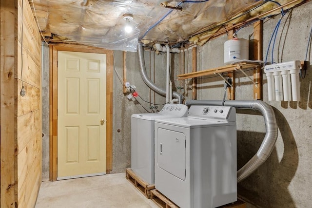 washroom featuring washing machine and dryer and laundry area