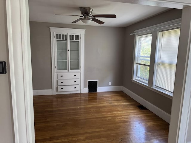 252-256 Billings St, Quincy, MA 02169 - spare room with wood finished floors, baseboards, and a ceiling fan