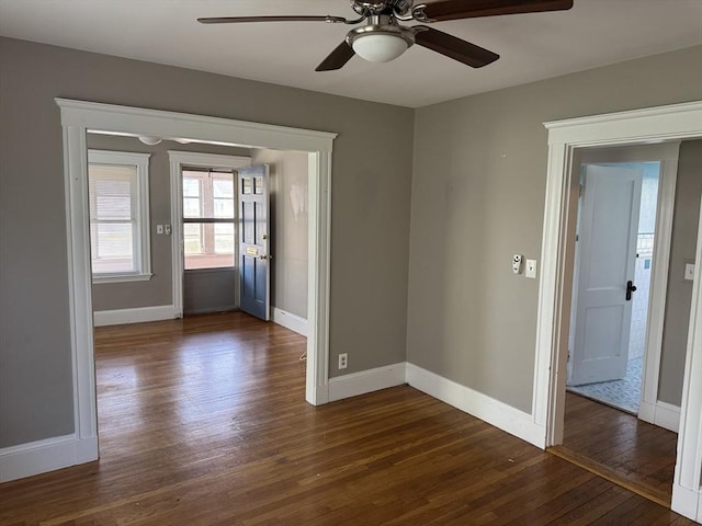 252-256 Billings St, Quincy, MA 02169 - empty room featuring dark wood finished floors, ceiling fan, and baseboards