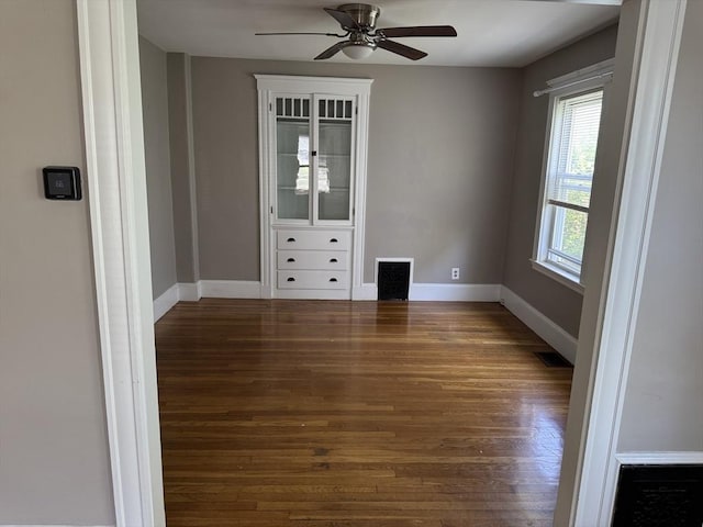 252-256 Billings St, Quincy, MA 02169 - empty room with wood finished floors, a ceiling fan, and baseboards