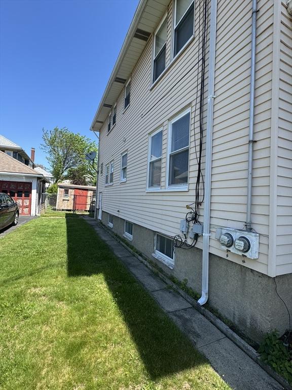 252-256 Billings St, Quincy, MA 02169 - view of property exterior with a yard