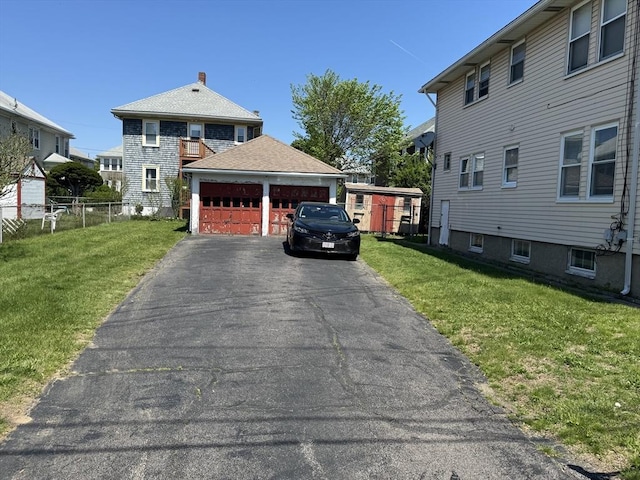 252-256 Billings St, Quincy, MA 02169 - view of front of property with a garage, an outdoor structure, roof with shingles, and a chimney