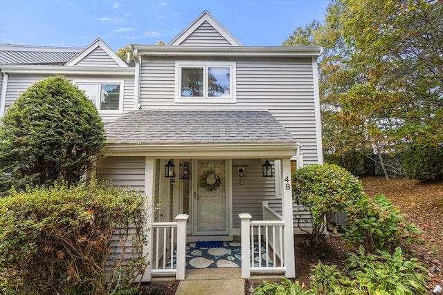 view of property with a porch