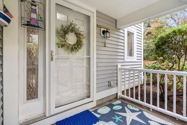 entrance to property with covered porch