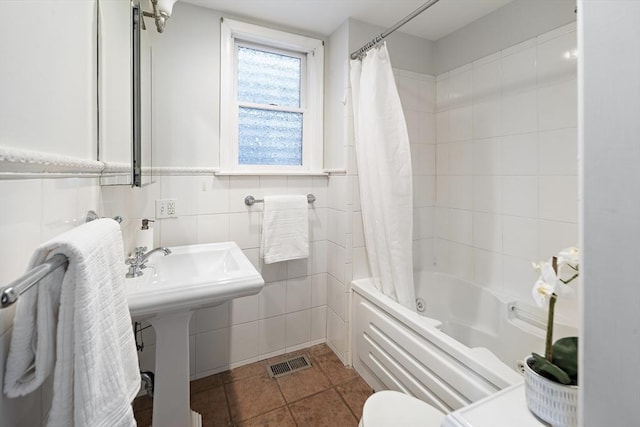 28 Summer St Unit 1, Somerville, MA 02143 - full bathroom featuring shower / tub combo with curtain, tile patterned flooring, tile walls, and toilet