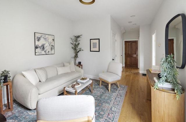 28 Summer St Unit 1, Somerville, MA 02143 - living area featuring light wood-style floors and baseboards