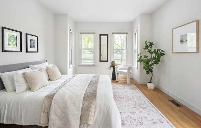 28 Summer St Unit 1, Somerville, MA 02143 - bedroom featuring light wood-style floors and baseboards