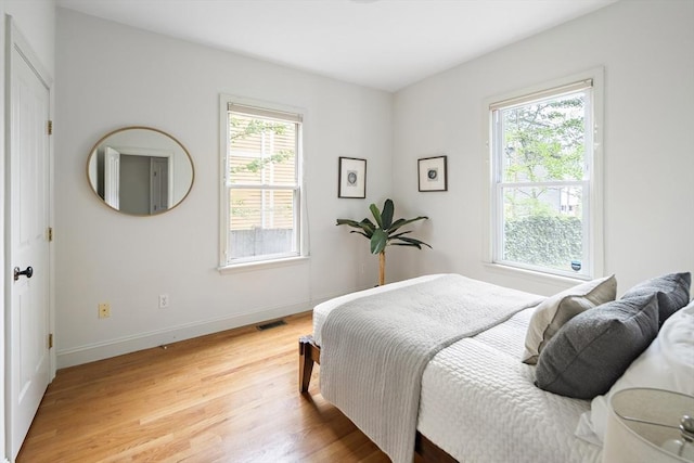 28 Summer St Unit 1, Somerville, MA 02143 - bedroom with light wood-style flooring and baseboards