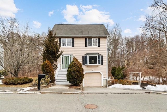 view of front of property with a garage