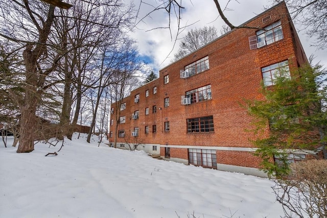 view of snow covered property