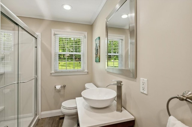 24 S Loomis St, Southwick, MA 01077 - bathroom with toilet, ornamental molding, a shower with shower door, baseboards, and vanity