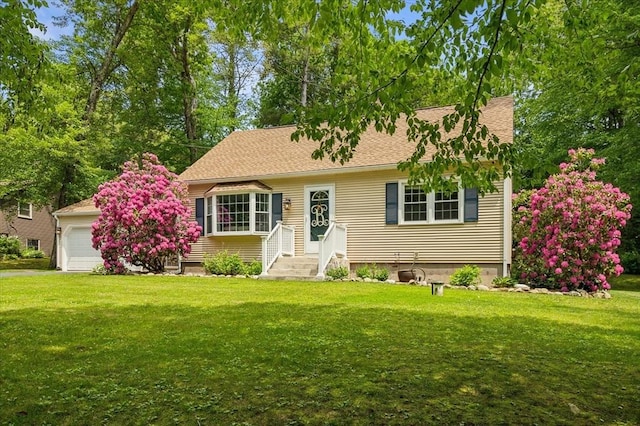 24 S Loomis St, Southwick, MA 01077 - view of front of property with a front yard and a garage