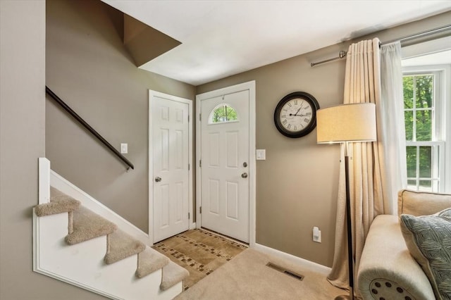 24 S Loomis St, Southwick, MA 01077 - carpeted foyer entrance with stairs and baseboards