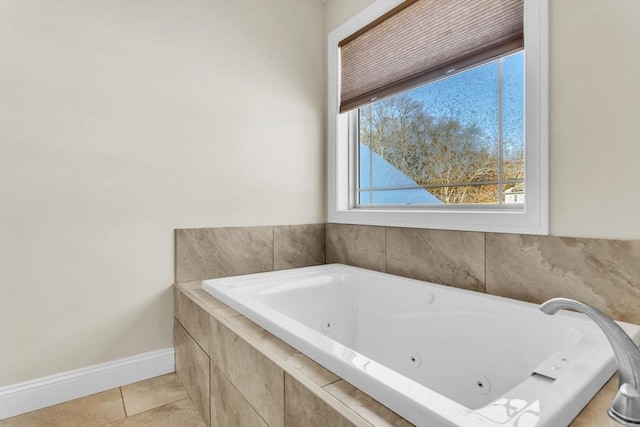 bathroom featuring tiled tub and tile patterned floors