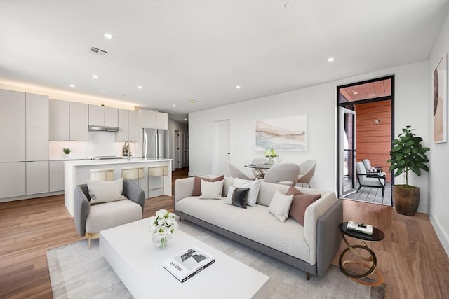 living room with light wood-type flooring