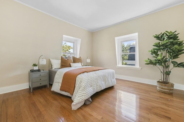14 Grand View Ave, Somerville, MA 02143 - bedroom featuring crown molding, baseboards, and wood finished floors