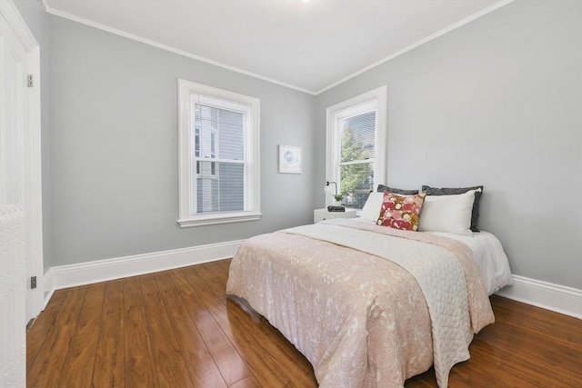 14 Grand View Ave, Somerville, MA 02143 - bedroom with crown molding, baseboards, and wood finished floors