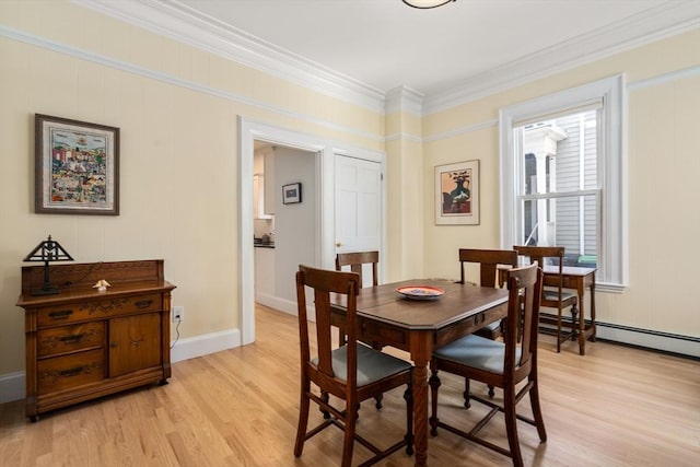 14 Grand View Ave, Somerville, MA 02143 - dining room with light wood finished floors, crown molding, and baseboards
