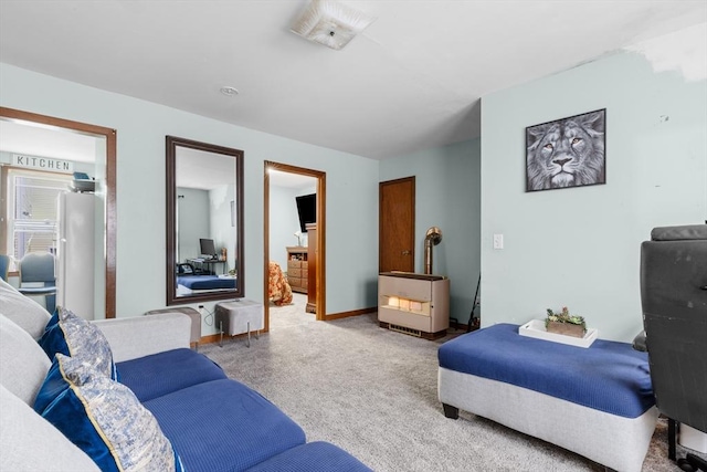 bedroom featuring carpet and connected bathroom