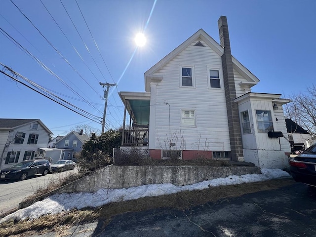 view of front of property with a chimney