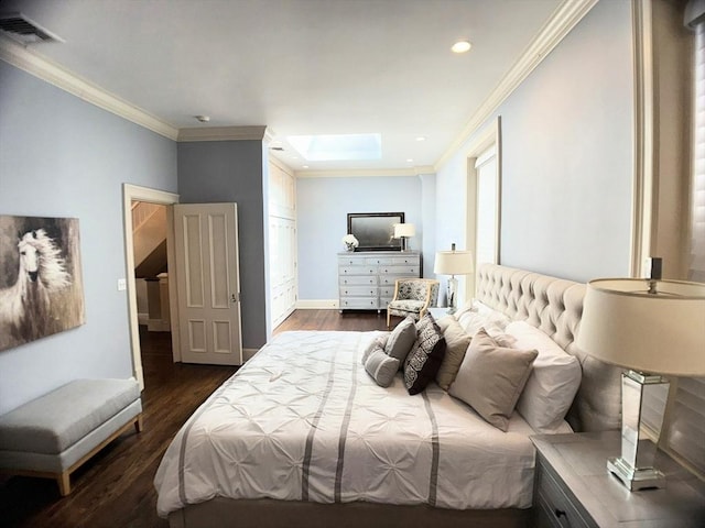 bedroom with a skylight, dark wood finished floors, crown molding, recessed lighting, and baseboards