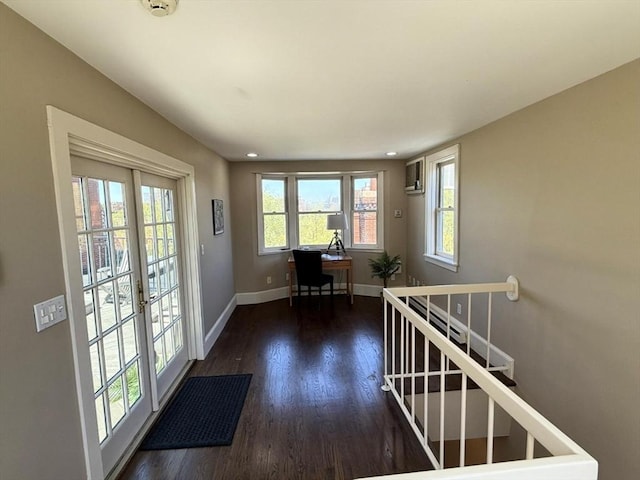 doorway featuring plenty of natural light, baseboards, wood finished floors, french doors, and recessed lighting