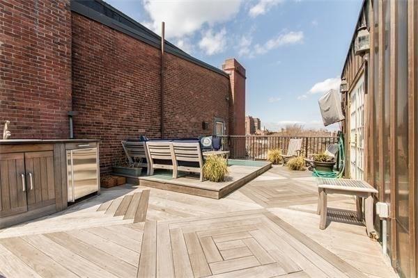 wooden deck featuring an outdoor hangout area