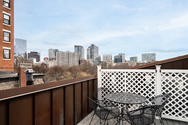 wooden balcony featuring a wooden deck