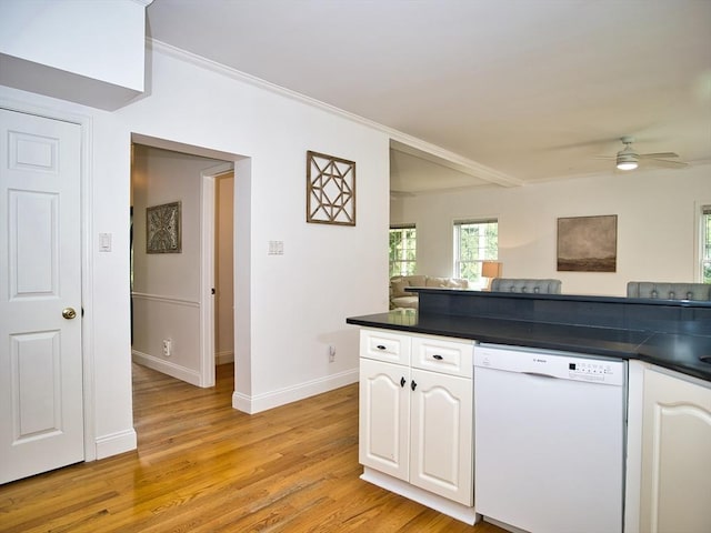 3 Eliza Ln, Dartmouth, MA 02747 - kitchen with white dishwasher, dark countertops, ceiling fan, light wood-style floors, and crown molding