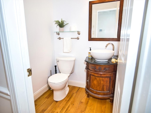 3 Eliza Ln, Dartmouth, MA 02747 - bathroom featuring vanity, wood finished floors, toilet, and baseboards