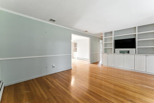 205 Mosier St, South Hadley, MA 01075 - unfurnished living room featuring ornamental molding, a baseboard radiator, and light wood-style floors