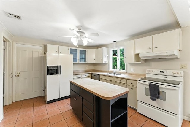205 Mosier St, South Hadley, MA 01075 - kitchen featuring white appliances, under cabinet range hood, a kitchen island, ceiling fan, and white cabinets