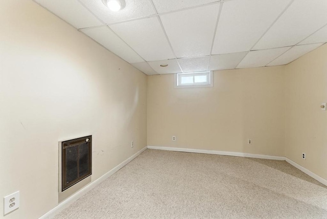 205 Mosier St, South Hadley, MA 01075 - below grade area featuring a paneled ceiling, heating unit, and carpet flooring