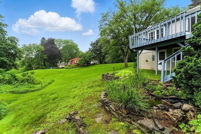 205 Mosier St, South Hadley, MA 01075 - view of green lawn featuring a wooden deck and view of wooded area